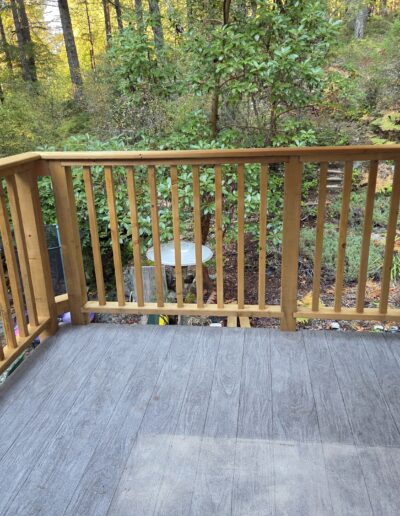 New Sienna-treated wood railings built by Steve’s Woodworking in Shawnigan Lake, providing a clean modern finish to the deck perimeter.